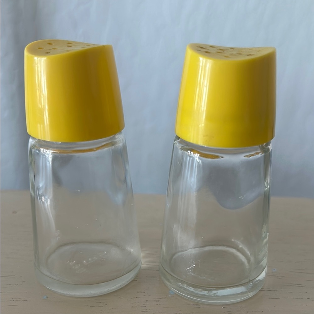 Yellow Topped Glass Shakers